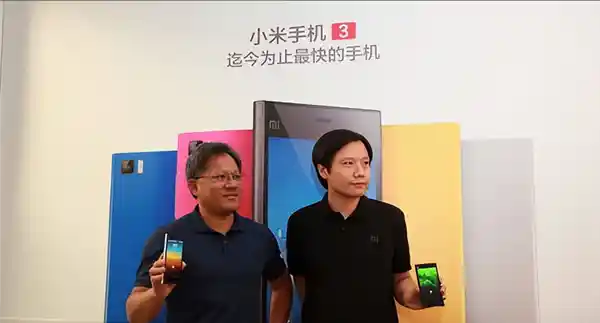 黄仁勋雷军同框微笑：科技巨头的跨界邂逅